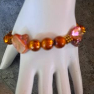 Mother of pearl 8" bracelet with vintage golden bronze beads and toggle closure